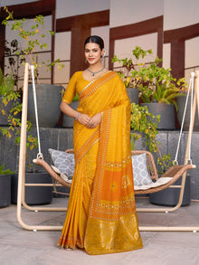 Bright yellow cotton saree with all over table print, foil or lace border, and contrast blouse Perfect for pooja