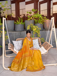 Bright yellow cotton saree with all over table print, foil or lace border, and contrast blouse Perfect for pooja