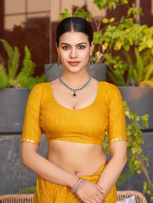 Bright yellow cotton saree with all over table print, foil or lace border, and contrast blouse Perfect for pooja