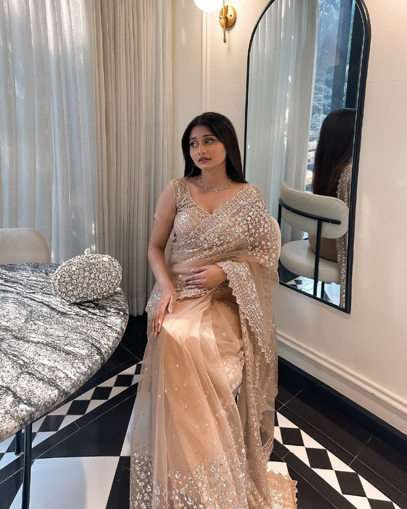 Beige Net Saree with Silver Sequin Embroidery for Parties