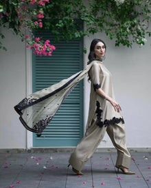 Beige Silk Salwar Suit with Black Embroidery Detailing