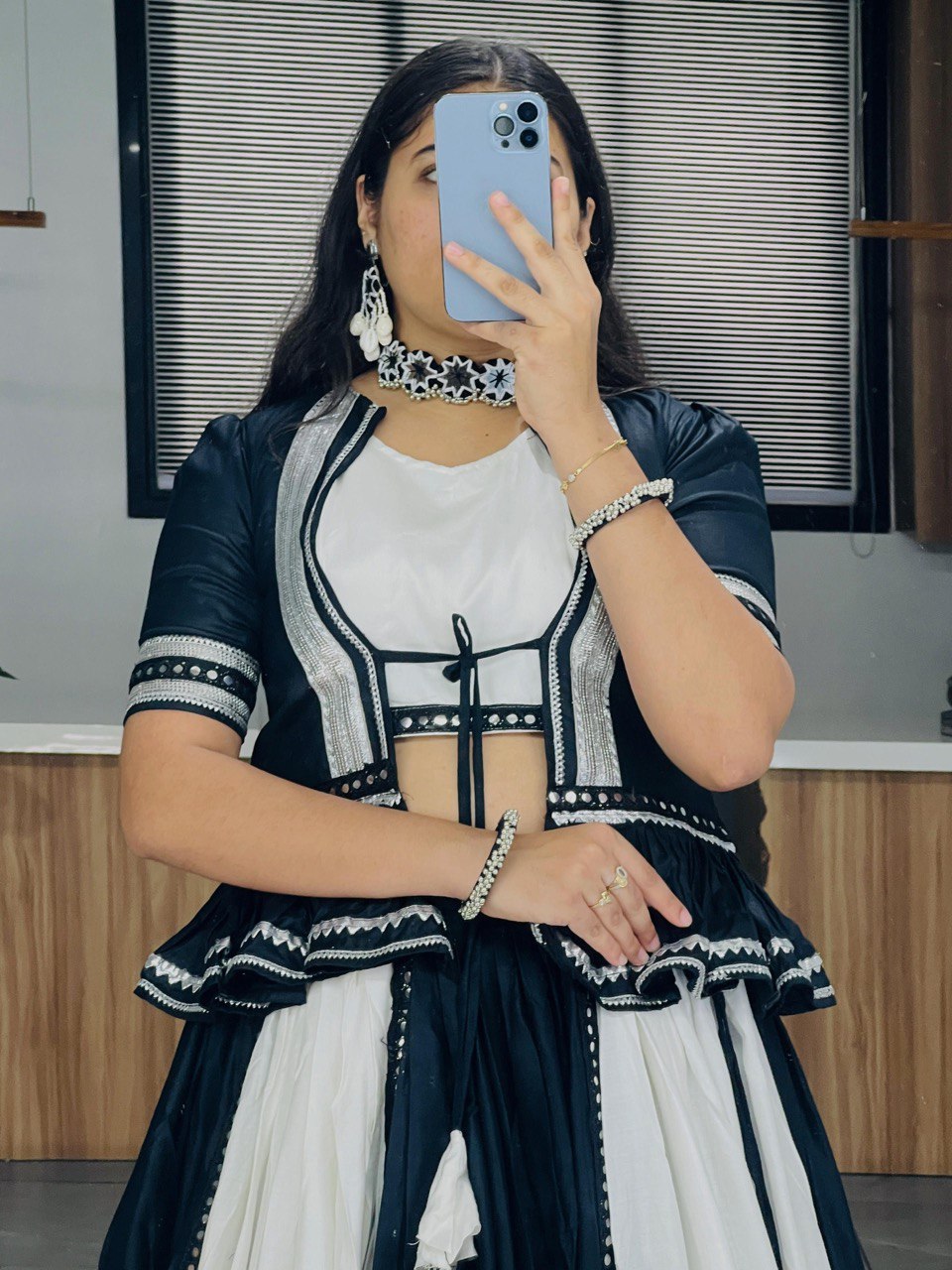 Black and white lehenga choli with mirror work for Navratri Garba nights