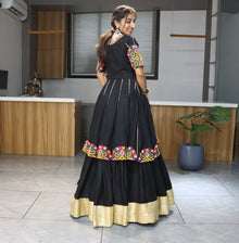 Black lehenga choli with colorful mirror embroidery for Navratri and festive occasions