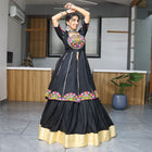 Black lehenga choli with colorful mirror embroidery for Navratri and festive occasions