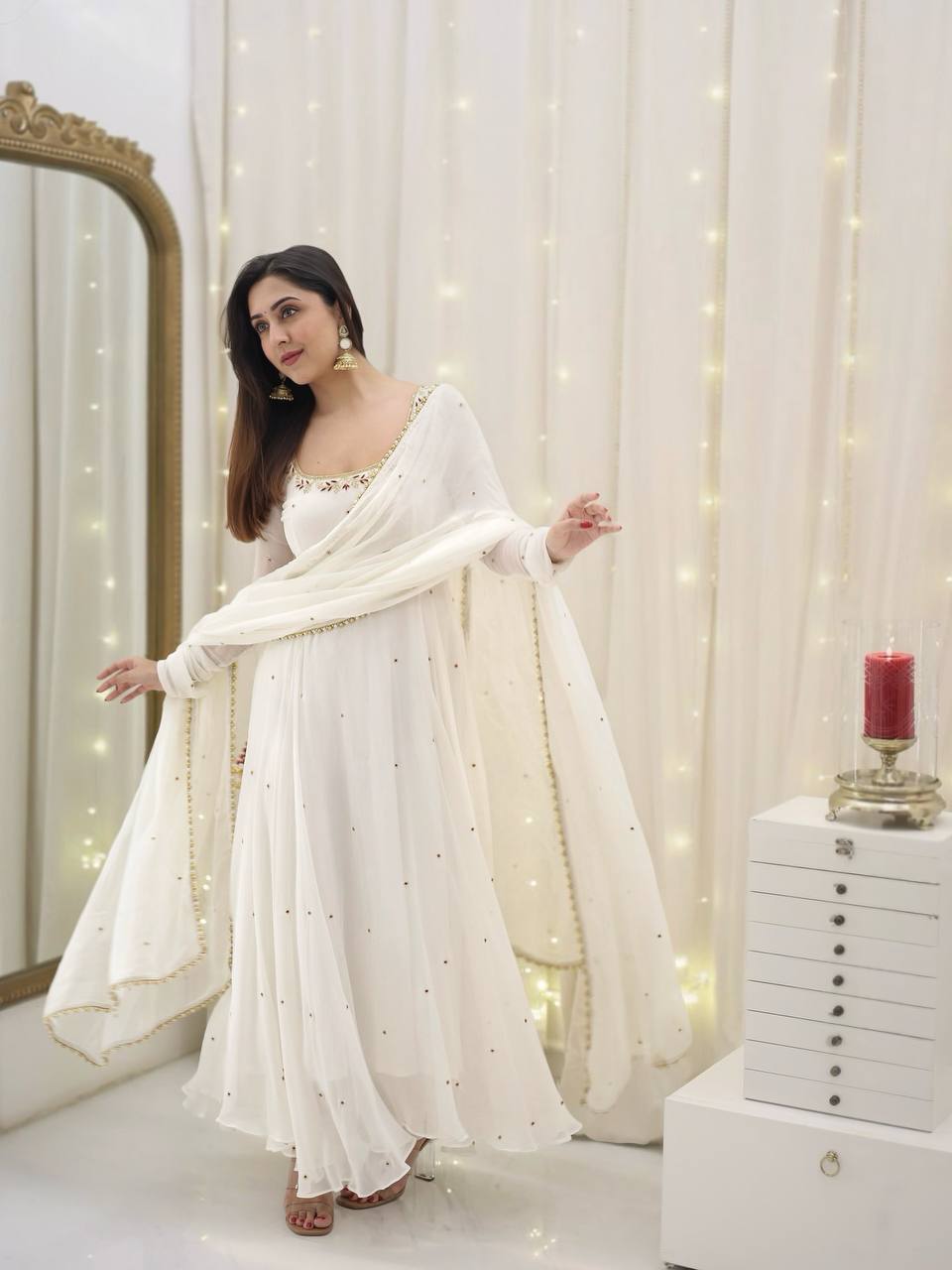 Graceful white anarkali salwar suit with subtle sequin work and dupatta – perfect for festive wear, weddings, or Eid looks.