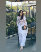 Elegant white cotton salwar suit with multicolor floral embroidery