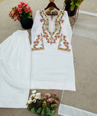 Elegant white cotton salwar suit with multicolor floral embroidery