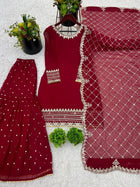 Maroon sharara suit with golden embroidery and net dupatta for weddings and festive occasions