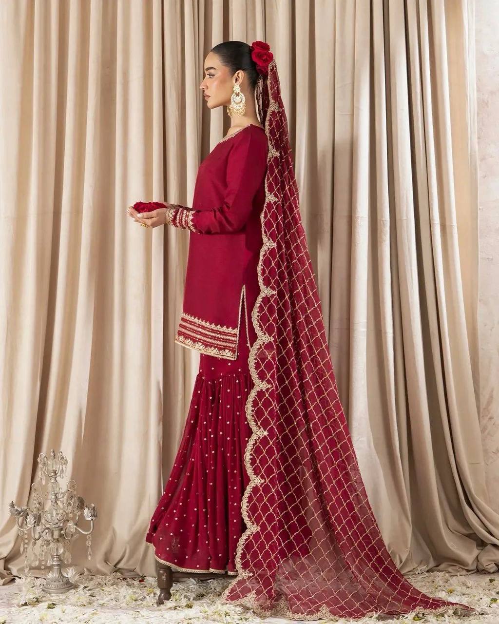 Maroon sharara suit with golden embroidery and net dupatta for weddings and festive occasions