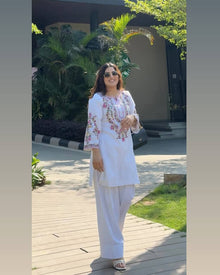 Elegant white cotton salwar suit with multicolor floral embroidery