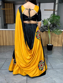 Elegant Black and Mustard Yellow Chaniya Choli with Traditional Mirror Work Embroidery