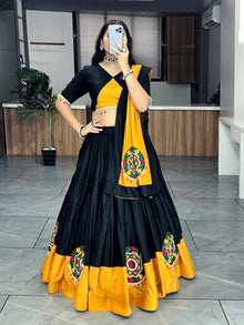 Elegant Black and Mustard Yellow Chaniya Choli with Traditional Mirror Work Embroidery