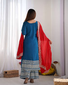 Elegant Blue Embroidered Suit with Red Dupatta for Festive and Wedding Wear