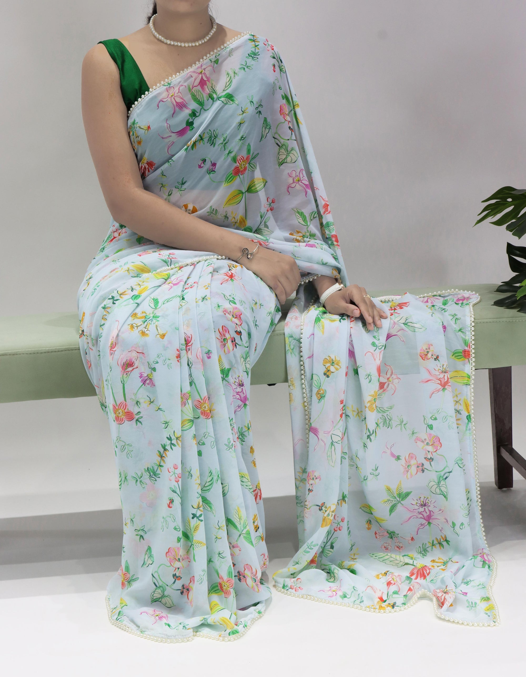 Elegant Light Blue Floral Print Organza Saree with Pearl Border Casual & Festive Daywear