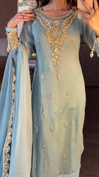Elegant Light Blue Sharara Suit with Golden Embroidery and Net Dupatta