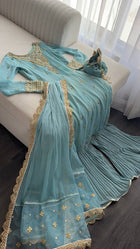 Elegant Light Blue Sharara Suit with Golden Embroidery and Net Dupatta
