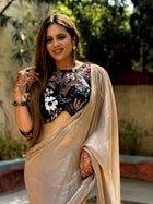 Elegant Light Gold Silk Saree with Black Embroidered Blouse for Festive Party Look