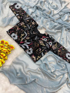 Elegant Light Gold Silk Saree with Black Embroidered Blouse for Festive Party Look