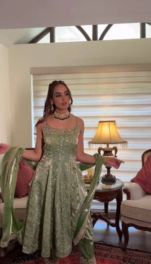 Elegant Light Green Anarkali Suit with Spaghetti Straps and Embroidered Dupatta