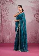 Elegant organza saree with floral embroidered border, perfect for festive events