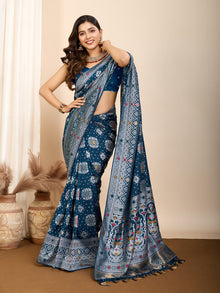 Elegant pure blue silk saree with intricate Mina Kari weaving and a grand rich pallu poojas, and cultural festivities.
