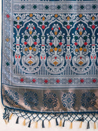 Elegant pure blue silk saree with intricate Mina Kari weaving and a grand rich pallu poojas, and cultural festivities.