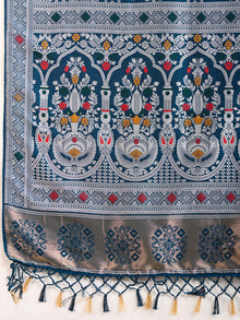 Elegant pure blue silk saree with intricate Mina Kari weaving and a grand rich pallu poojas, and cultural festivities.