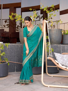 Turquoise Cotton Saree with Foil Print Border and Contrast Blouse Table Printed Design