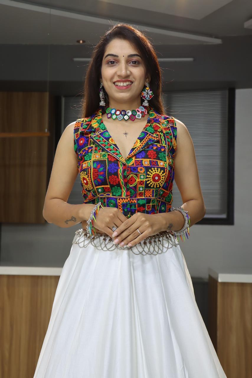 Elegant White Lehenga Choli with Multicolor Kutchi Embroidered Blouse Perfect for Navratri