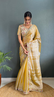 Golden Yellow Silk Saree with Embroidered Border and Designer Blouse for Festive Wear