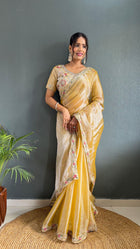 Golden Yellow Silk Saree with Embroidered Border and Designer Blouse for Festive Wear