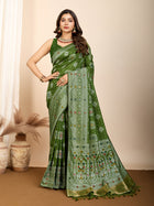 Graceful pure green silk saree with all over Mina Kari weaving and rich zari pallu.