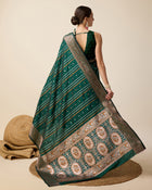Pure Jacquard silk saree in deep green with sona chandi zari, vibrant 3 zari weaving