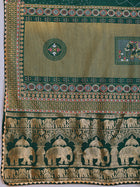 Green cotton saree with all-over table print and foil or lace border. Comes with a contrast blouse Perfect for festive