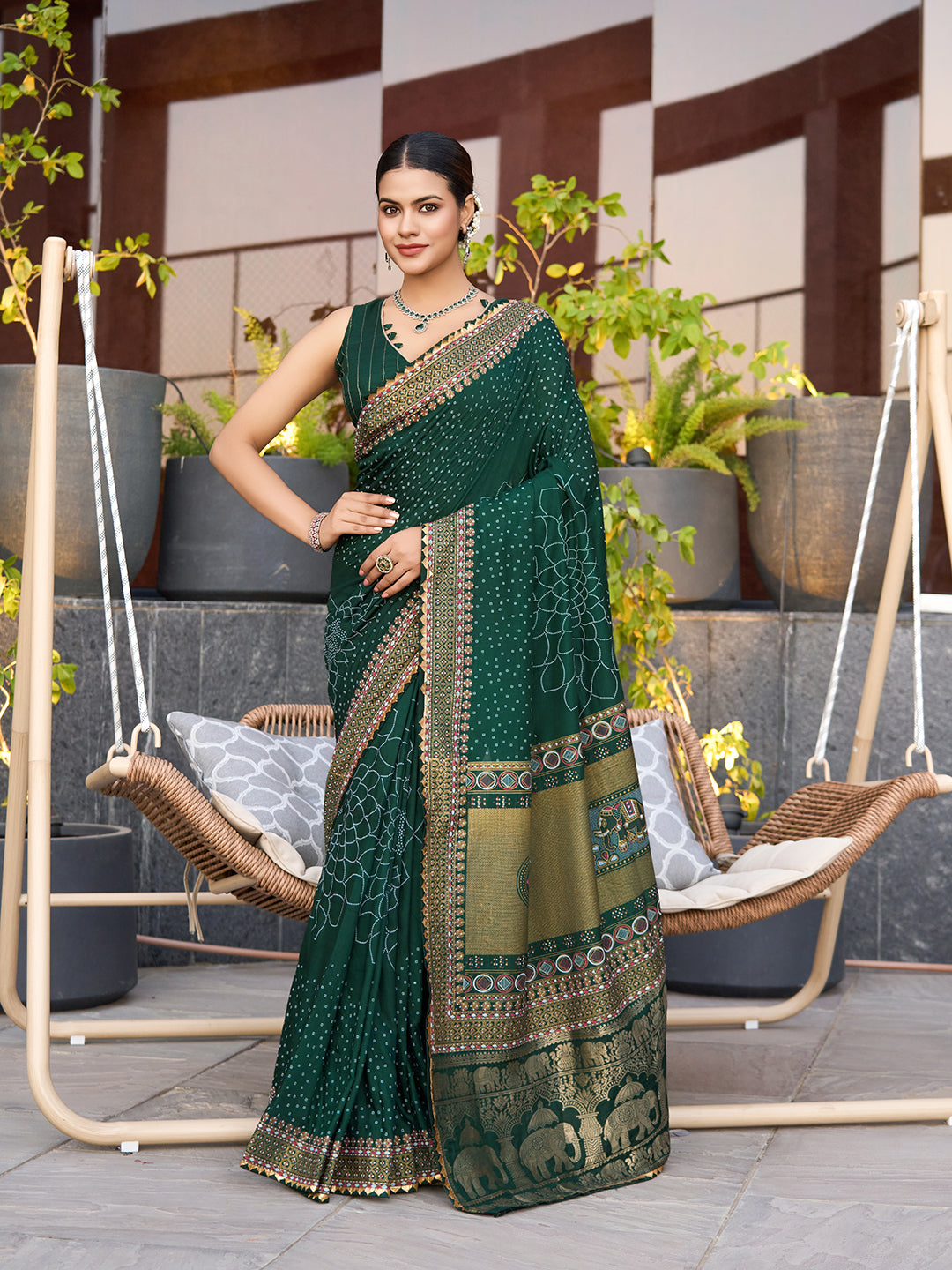 Green cotton saree with all-over table print and foil or lace border. Comes with a contrast blouse Perfect for festive