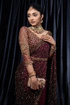 Maroon designer saree with heavy golden sequin embroidery for weddings and festive wear