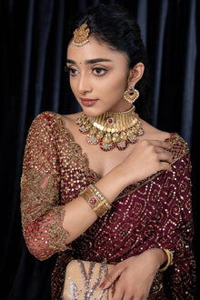 Maroon designer saree with heavy golden sequin embroidery for weddings and festive wear