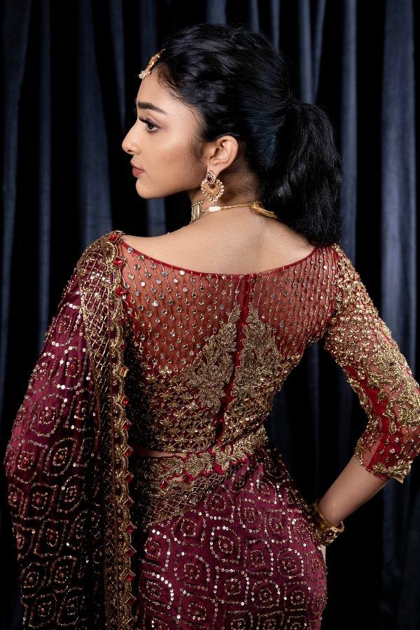Maroon designer saree with heavy golden sequin embroidery for weddings and festive wear