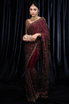 Maroon designer saree with heavy golden sequin embroidery for weddings and festive wear