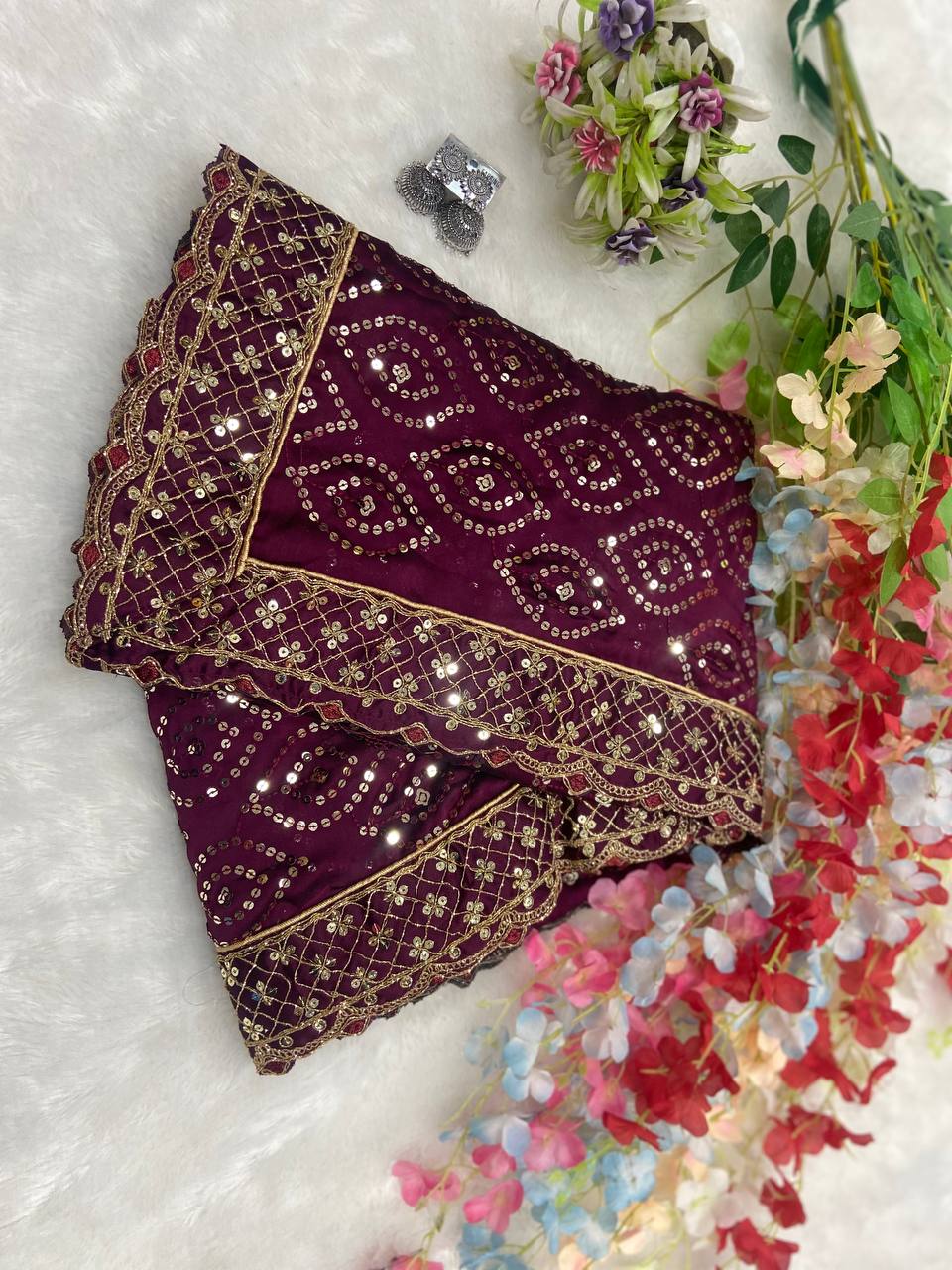 Maroon designer saree with heavy golden sequin embroidery for weddings and festive wear