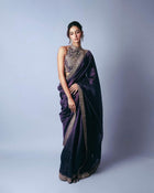 Regal Deep Purple Silk Saree with Heavy Embroidered High-Neck Blouse for Party and Reception