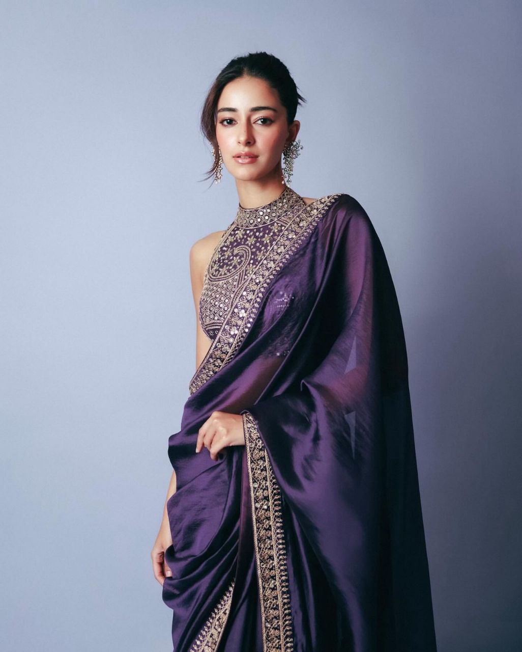 Regal Deep Purple Silk Saree with Heavy Embroidered High-Neck Blouse for Party and Reception