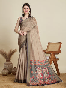 Stylish brown semi cotton saree featuring dancing girl butti, zari border and contrast blouse.