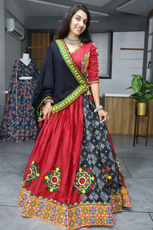 Traditional Red and Black Navratri Lehenga Choli with Kutchi Embroidery and PomPom Dupatta