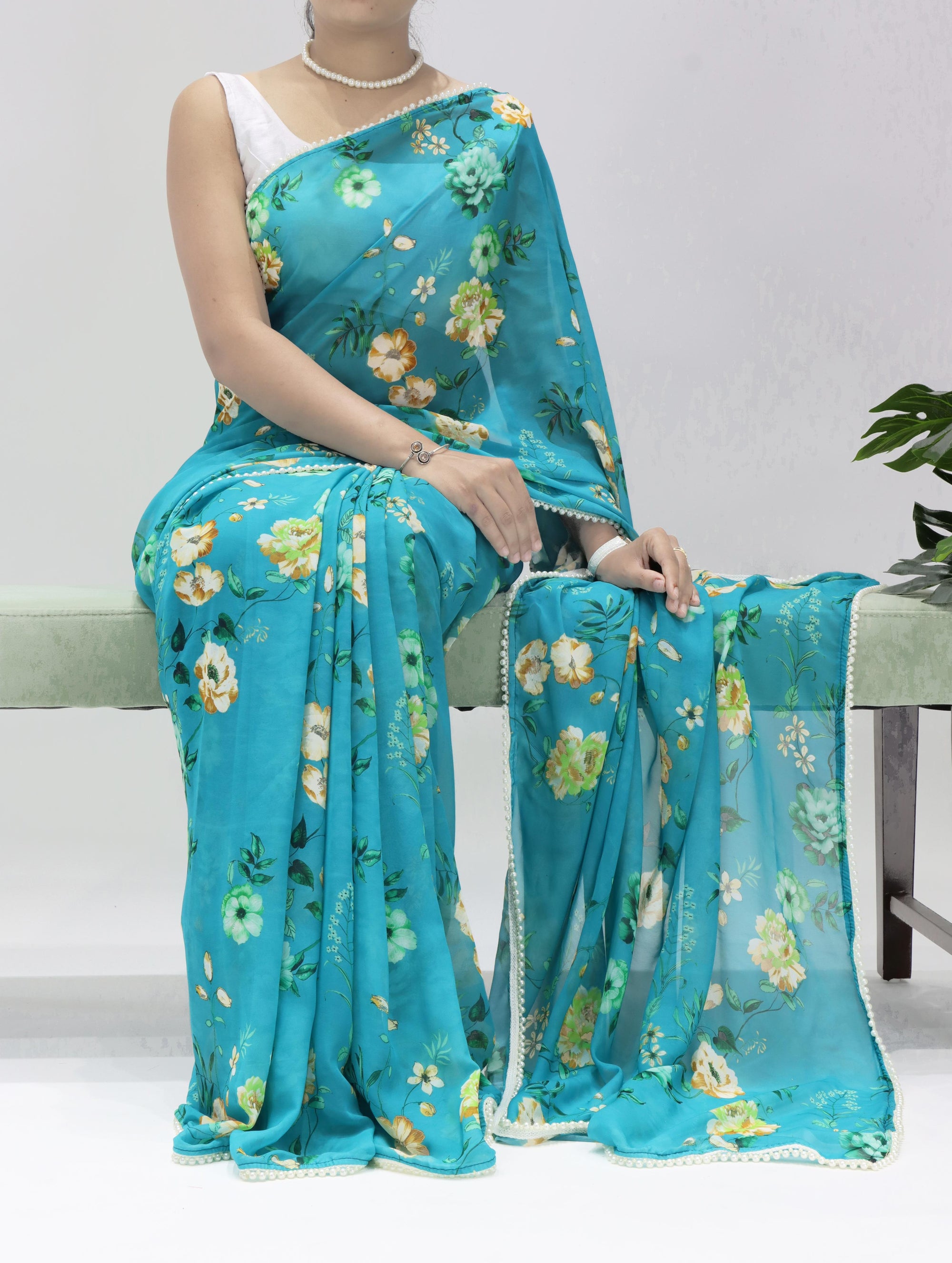Turquoise Blue Floral Organza Saree with Pearl Lace Border Summer Casual