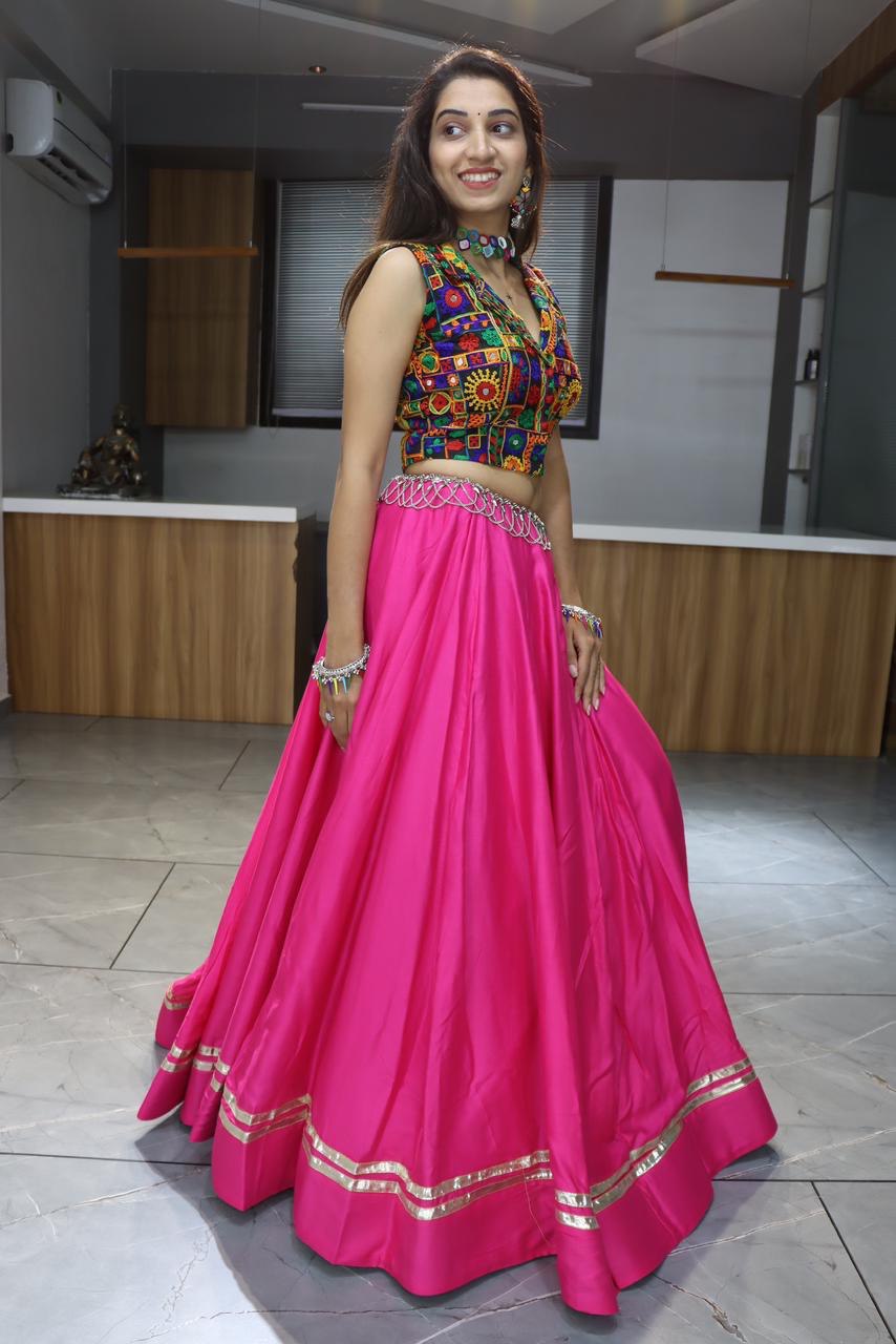 Vibrant Hot Pink Lehenga Choli with Kutchi Embroidered Blouse for Navratri and Garba Nights