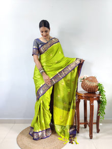 vibrant-parrot-green-kanjivaram-silk-saree-with-navy-blue-zari-border