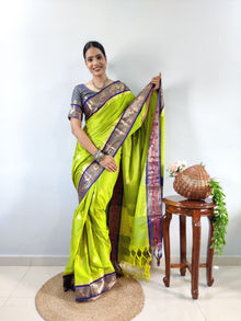 vibrant-parrot-green-kanjivaram-silk-saree-with-navy-blue-zari-border
