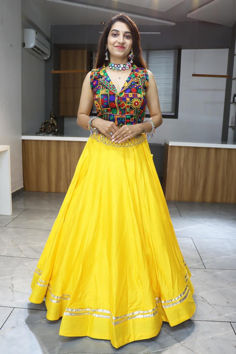 Vibrant Yellow Lehenga Choli with Traditional Kutchi Embroidered Blouse for Navratri