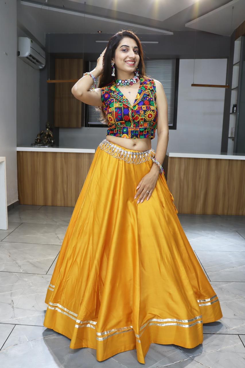 Vibrant Yellow Lehenga Choli with Traditional Kutchi Embroidered Blouse for Navratri